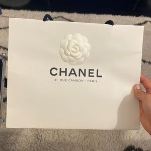 White Chanel 31 Rue Camron paper bag